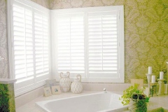 white-bathroom-plantation-shutters