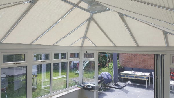 image of customised white conservatory roof blinds