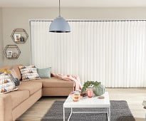 image of living room with white customised blinds
