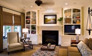 Traditional living room with shelving and bay window blinds