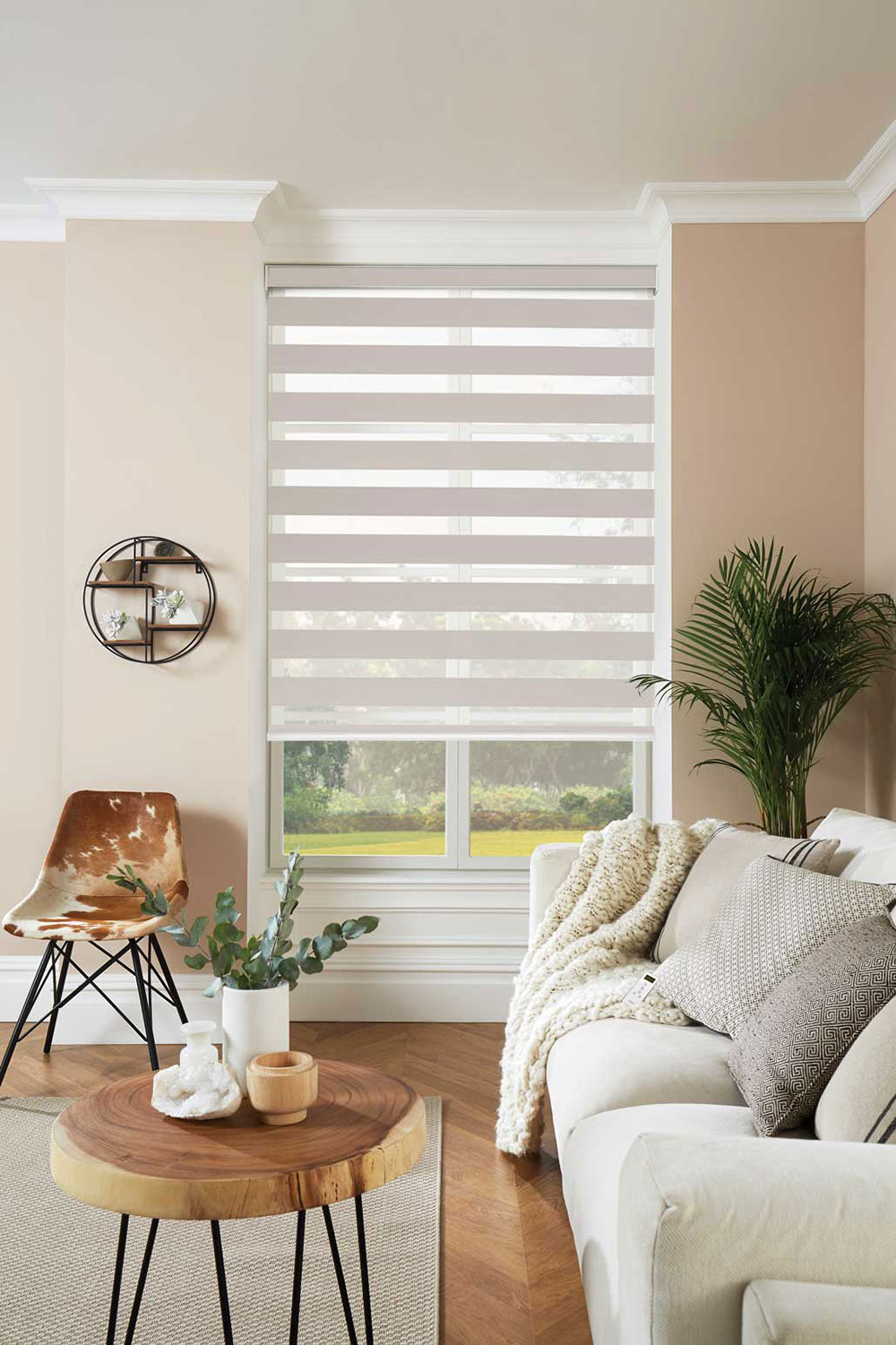 Cream coloured Duo Vision blinds shown with the opaque layers aligned in a three quarters down position