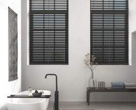 Luxaflex Blind in the bathroom - ultimate style with black louvres.